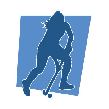 Çim hokeyi oynayan kadın atlet silueti. Çim hokeyi oynayan bir kadının silueti..