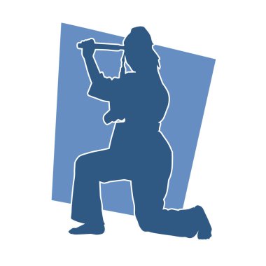 Doğu dövüş sanatı pozu vermiş bir kadının silueti. Dövüş sanatlarında bir kadının silueti..