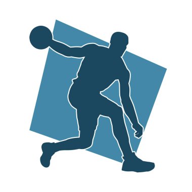 Aksiyon pozisyonunda bir basketbol sporcusunun silueti. Basketbol oynayan bir adamın silüeti..