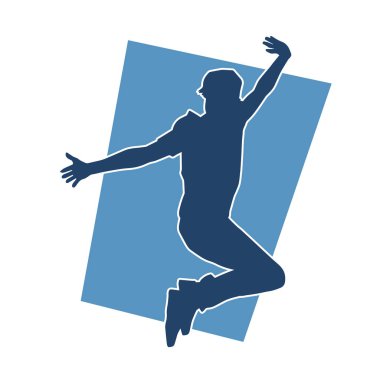 Poz veren bir erkek dansçının silueti. Dans eden bir adamın silueti.