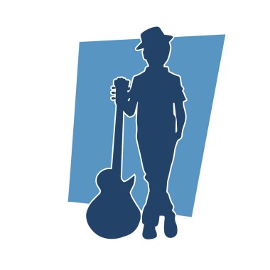 Elektro gitar enstrümanlı genç bir gitaristin silüeti..