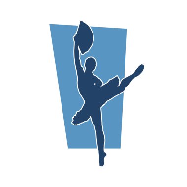 Poz vermiş bir balerin kadın silueti. Hareket halindeki bir balerin silueti..