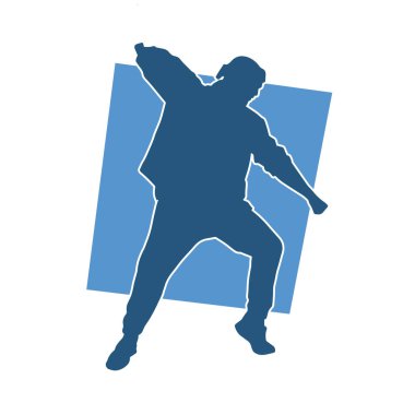 Poz veren bir erkek dansçının silueti. Dans eden bir adamın silueti.