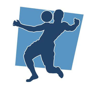 Top tekmeleyen bir erkek futbolcunun silueti. Hareket halindeki bir futbolcunun silueti.