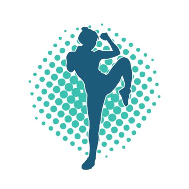 Dövüş sanatları tekmesi atan bir kadının silueti. Sportif bir kadının silueti tekme hareketi yapıyor..