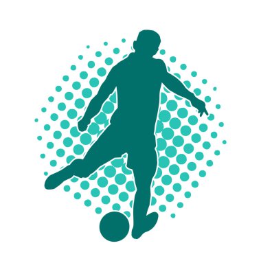 Futbol oynayan bir adamın silüeti. Hareket halindeki bir futbolcunun silueti.