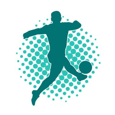 Top tekmeleyen bir erkek futbolcunun silueti. Hareket halindeki bir futbolcunun silueti.