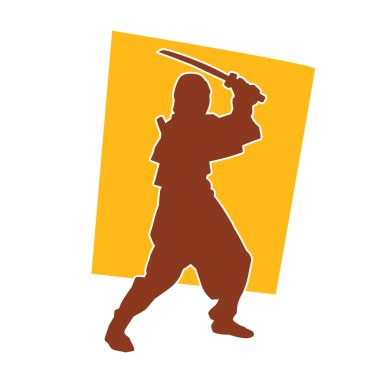 Samuray kılıcı taşıyan dövüş sanatları kostümlü bir erkek dövüşçünün silueti.. 