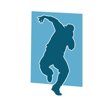 Dans eden zayıf bir erkeğin silueti. Dans eden bir adamın silueti.