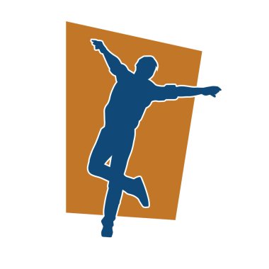 Hareket halindeki bir erkek dansçının silueti. Dans eden zayıf bir adamın silueti..