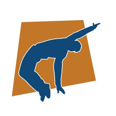 Hareket halindeki bir erkek dansçının silueti. Dans eden zayıf bir adamın silueti..