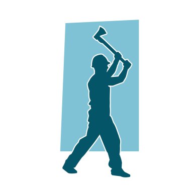 Hareket halindeki bir işçinin silueti, baltasını kullanarak poz verir..