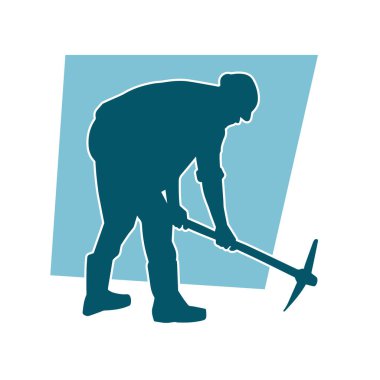 Balta taşıyan işçi kostümlü bir adamın silüeti..