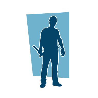 Çekiç aleti taşıyan bir işçinin silüeti. Hareket halindeki bir işçinin silueti çekiç aleti ile poz verir.