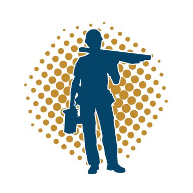 Tahta taşıyan bir inşaat işçisinin silueti..