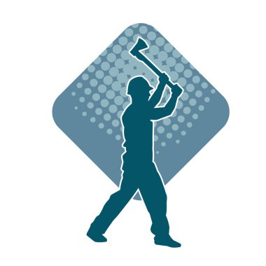 Hareket halindeki bir işçinin silueti, baltasını kullanarak poz verir..