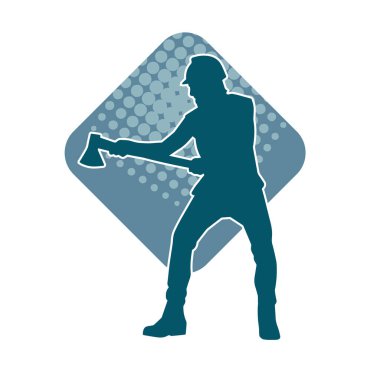 Hareket halindeki bir işçinin silueti, baltasını kullanarak poz verir..