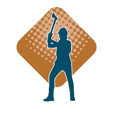 Hareket halindeki bir işçinin silueti, baltasını kullanarak poz verir..