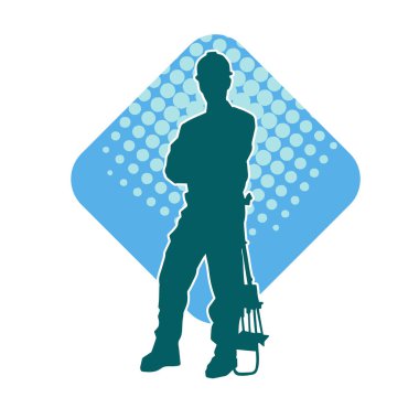 İnşaat işçisi kostümlü bir adamın silueti. İnşaat işçisinin silueti pozda.. 