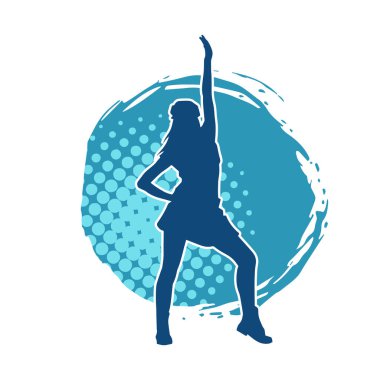 Hareketli pozlarda mini etek giyen bir kadın dansçının silueti. Zayıf bir kadının silueti mutlu bir şekilde dans ediyor..