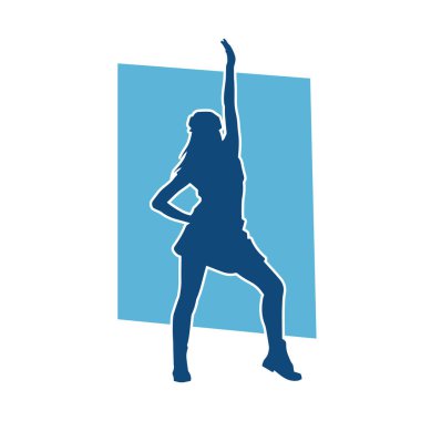 Hareketli pozlarda mini etek giyen bir kadın dansçının silueti. Zayıf bir kadının silueti mutlu bir şekilde dans ediyor..