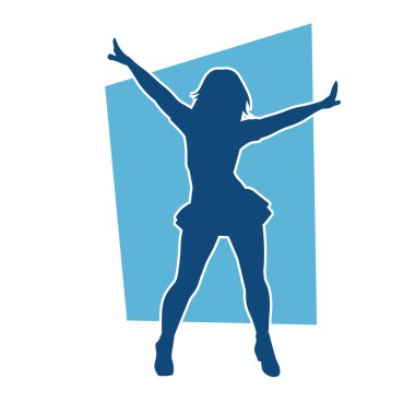 Hareketli pozlarda mini etek giyen bir kadın dansçının silueti. Zayıf bir kadının silueti mutlu bir şekilde dans ediyor..