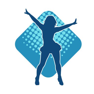 Hareketli pozlarda mini etek giyen bir kadın dansçının silueti. Zayıf bir kadının silueti mutlu bir şekilde dans ediyor..