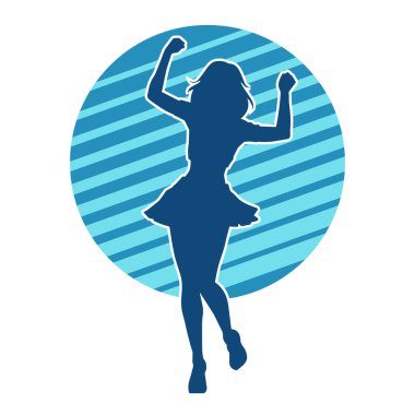 Hareketli pozlarda mini etek giyen bir kadın dansçının silueti. Zayıf bir kadının silueti mutlu bir şekilde dans ediyor..