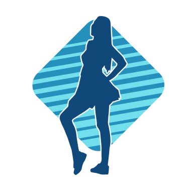 Hareketli pozlarda mini etek giyen bir kadın dansçının silueti. Zayıf bir kadının silueti mutlu bir şekilde dans ediyor..