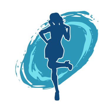 Hareketli pozlarda mini etek giyen bir kadın dansçının silueti. Zayıf bir kadının silueti mutlu bir şekilde dans ediyor..