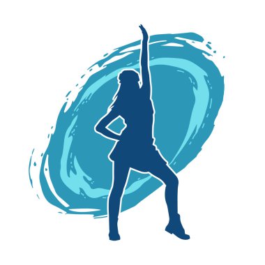 Hareketli pozlarda mini etek giyen bir kadın dansçının silueti. Zayıf bir kadının silueti mutlu bir şekilde dans ediyor..