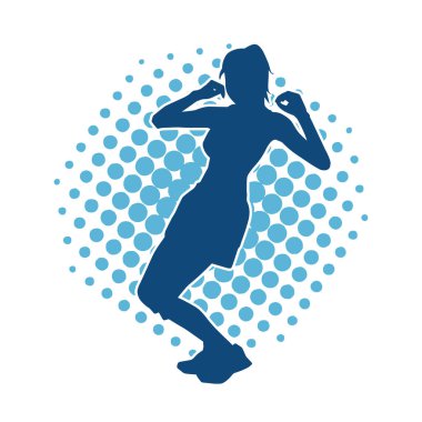 Hareketli pozlarda mini etek giyen bir kadın dansçının silueti. Zayıf bir kadının silueti mutlu bir şekilde dans ediyor..