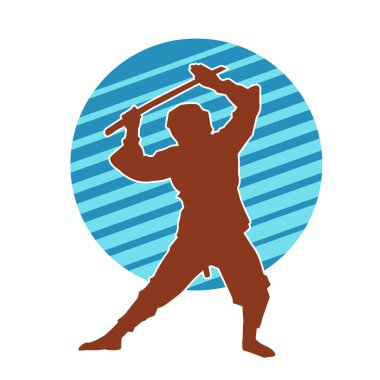 Samuray kılıcı taşıyan dövüş sanatları kostümlü bir erkek dövüşçünün silueti.. 