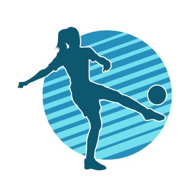 Topa vuran bayan futbolcunun silueti. Hareketli bir futbolcu kadının silueti..