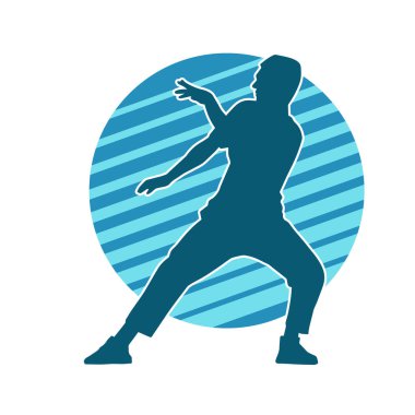 Hareket halindeki bir erkek dansçının silueti. Dans eden zayıf bir adamın silueti..