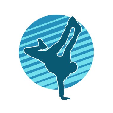 Poz veren bir erkek dansçının silueti. Dans eden bir adamın silueti.