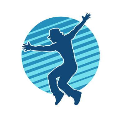 Hareket halindeki bir erkek dansçının silueti. Dans eden zayıf bir adamın silueti..