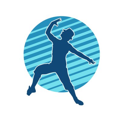 Hareket halindeki bir erkek dansçının silueti. Dans eden zayıf bir adamın silueti..