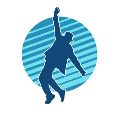 Hareket halindeki bir erkek dansçının silueti. Dans eden zayıf bir adamın silueti..