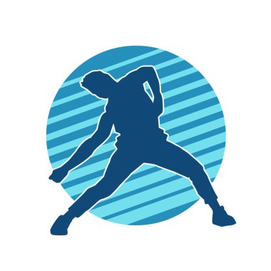 Hareket halindeki bir erkek dansçının silueti. Dans eden zayıf bir adamın silueti..