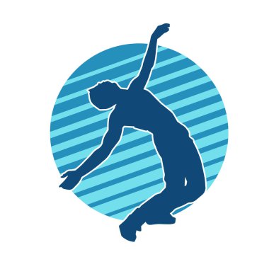 Hareket halindeki bir erkek dansçının silueti. Dans eden zayıf bir adamın silueti..