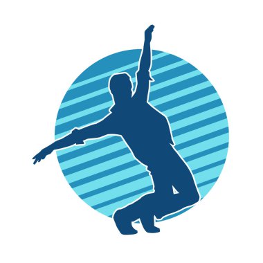 Hareket halindeki bir erkek dansçının silueti. Dans eden zayıf bir adamın silueti..