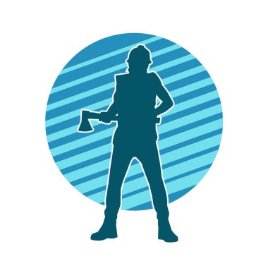 Hareket halindeki bir işçinin silueti, baltasını kullanarak poz verir..