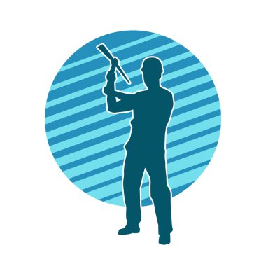 Görev sırasında baltayla dolaşan işçi kostümlü bir adamın silüeti. Bir madencinin hareket halindeki silueti balta aracı ile poz verir.