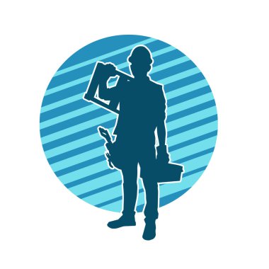 İnşaat işçisi kostümlü bir adamın silueti. İnşaat işçisinin silueti pozda.. 