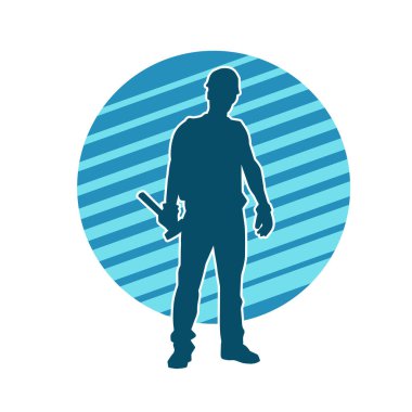 Çekiç aleti taşıyan bir işçinin silüeti. Hareket halindeki bir işçinin silueti çekiç aleti ile poz verir.