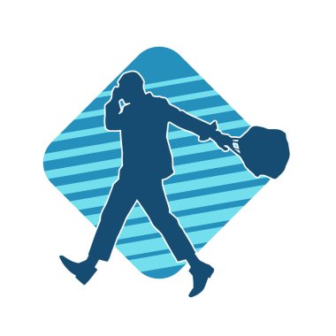 Evrak çantası taşıyan bir iş adamının silüeti.