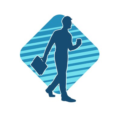 Evrak çantası taşıyan bir iş adamının silüeti.