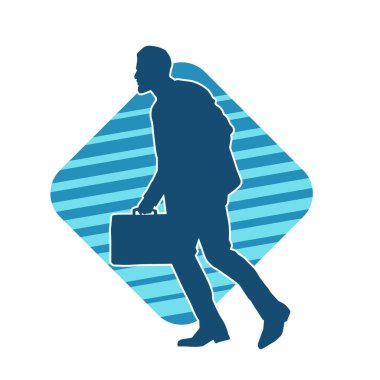 Evrak çantası taşıyan bir iş adamının silüeti.