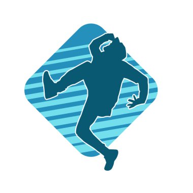 Hareket halindeki bir erkek dansçının silueti. Dans eden zayıf bir adamın silueti..